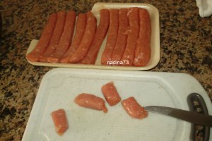 Cartofi noi cu carnaciori  la cuptor