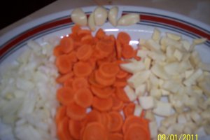 Cotlet de porc cu sos de legume la cuptor