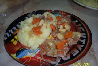 Cotlet de porc cu sos de legume la cuptor