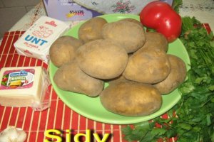 Cartofi cu parmezan in vasul roman