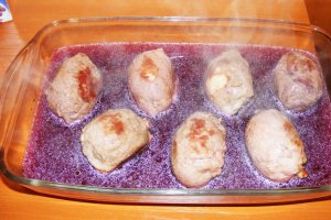 Ouă înfăşurate în muşchi de porc