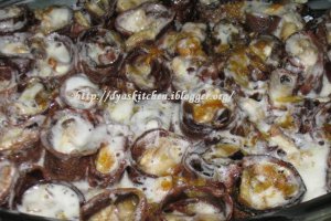 Budinca de clatite (cu sos de ciocolata si banane in sirop de portocale)