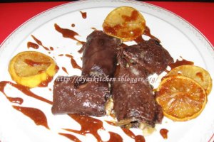 Budinca de clatite (cu sos de ciocolata si banane in sirop de portocale)