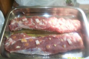 Muschi de porc la tava