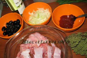 Cotlet de iepure in sos de vin si masline