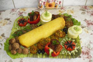 Rulada din piept de pui cu ciuperci invelita in cascaval
