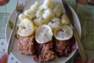 Pangasius pane cu garnitura de cartofi natur