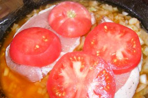 Cotlet de porc cu rosii la cuptor
