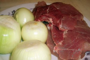 File de porc cu sos de ceapa