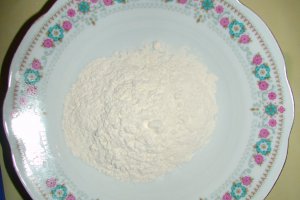Reteta de preparare a papanasilor cu smantana si peltea