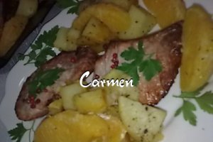 Cotlet de porc cu portocale si cartofi la cuptor.