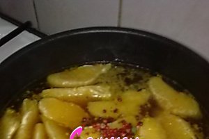 Cotlet de porc cu portocale si cartofi la cuptor.