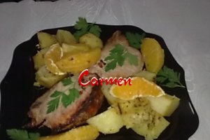 Cotlet de porc cu portocale si cartofi la cuptor.