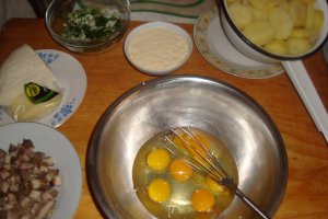 Cartofi gratinati cu pulpa de porc la cuptor