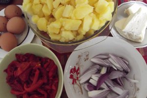 Cartofi la cuptor cu ardei copti