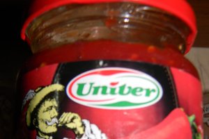 Tagliolini rosii cu mazare si porc
