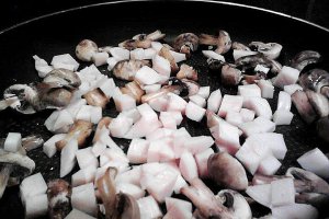 Ravioli con funghi e prosciutto di pollo