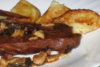 Friptura de vitel cu cartofi copti