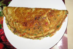 Omleta impaturata cu bacon, cascaval si ciuperci