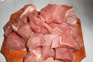 Pulpa de porc si orez la tuci