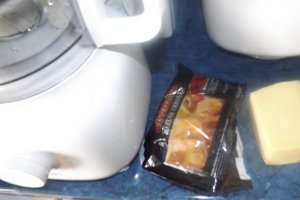Melcisiori si conopida gratinate, sub crusta de bacon