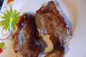 Friptura de porc cu sos de unt si lamaie