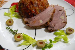 Pulpa de porc coapta in foi de varza  murata