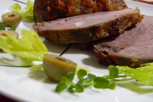 Pulpa de porc coapta in foi de varza  murata