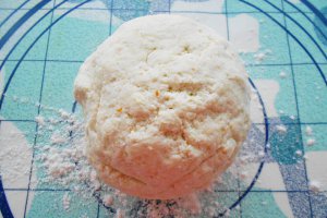 Papanași cu smântână și dulceață de merișoare