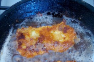 Dovlecei umpluti cu cascaval pane pe pat de cus-cus cu legume