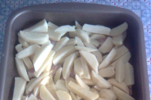 Muschiulet afumat de porc cu cartofi si ciuperci la cuptor