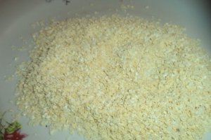 Snitele de porc in crusta din fulgi de mei