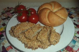 Snitele de porc in crusta din fulgi de mei