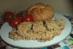 Snitele de porc in crusta din fulgi de mei