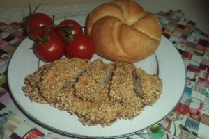 Snitele de porc in crusta din fulgi de mei