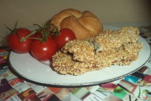 Snitele de porc in crusta din fulgi de mei