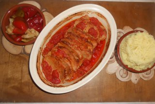 Cotlet de porc cu rosii cherry la cuptor