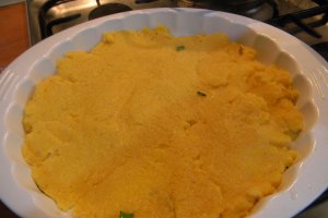Mamaliguta gratinata cu branzeturi si iaurt