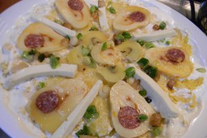 Mamaliguta gratinata cu branzeturi si iaurt