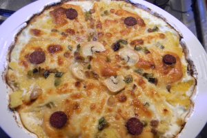 Mamaliguta gratinata cu branzeturi si iaurt