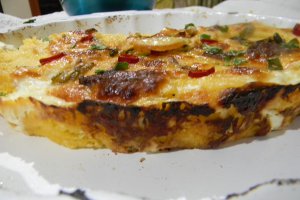 Mamaliguta gratinata cu branzeturi si iaurt