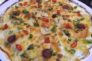 Mamaliguta gratinata cu branzeturi si iaurt