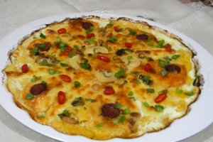Mamaliguta gratinata cu branzeturi si iaurt