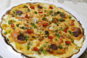 Mamaliguta gratinata cu branzeturi si iaurt