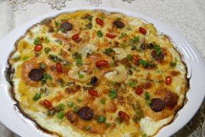 Mamaliguta gratinata cu branzeturi si iaurt