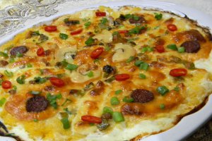 Mamaliguta gratinata cu branzeturi si iaurt