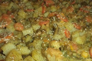 Piept de pui in crusta de fulgi de orez cu legume la cuptor