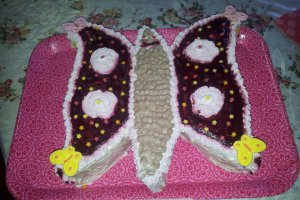Tort Fluture cu crema de sampanie si fructe de padure