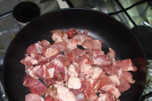 Pulpa de porc cu patrunjel si lamaie