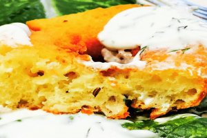 Aperitiv reteta de preparare a papanasilor rustici cu branza sarata si sos de smantana